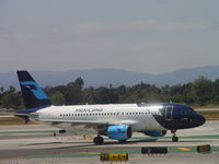 N612MX @ LAX - Taxiing to 24L - by Helicopterfriend