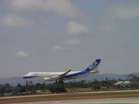 JA05KZ @ LAX - Landing 24R - by Helicopterfriend