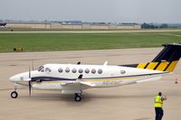 N641MC @ CID - Taxiing close to my window to turn for runway 13. - by Glenn E. Chatfield