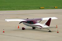 N702DB @ CID -  Parked on the ramp by the tower