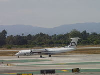 N431QX @ LAX - Rolling on take off 24L - by Helicopterfriend