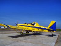 N212DT @ 206 - rigged as sprayer @ Chowchilla, CA - by tim zimmerman