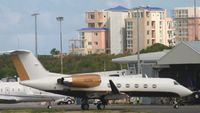 N211DK @ TNCM - park at the  tncm ramp