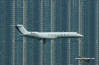 N888HK @ VHHH - Bizz jet landing in front of the towers from Tung Chung - by Michel Teiten ( www.mablehome.com )
