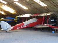 G-ANEN @ EGTN - Tiger in the hangar at Enstone