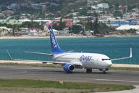 C-FYQO @ TNCM - Back tracking runway 10