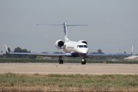 N718DW @ SCK - Holding Short waiting for a Cessna 172 on final - by Dayv Glusing