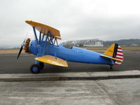 N66418 @ TMK - A west coast visitor. An old wooden blimp hanger is in the background. - by Lawrence Johnson
