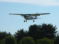 N1413V @ 2D7 - Landing on 28 at the Beach City, Ohio Father's Day fly-in.