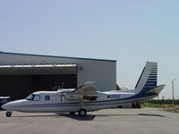 N186E @ POC - Parked at Howard Aviation - by Helicopterfriend