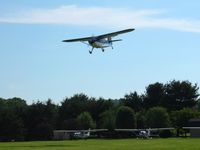 N97025 @ 2D7 - Arriving at the Father's Day fly-in; Beach City, Ohio.