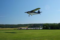 N97025 @ 2D7 - Landing on 28 at the Father's Day fly-in; Beach City, Ohio.