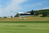 N97025 @ 2D7 - Landing on 28 at the Father's Day fly-in; Beach City, Ohio. - by Bob Simmermon