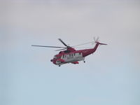 EI-GCE - EI-GCE SAR Helicopter in flight near Sheeps Head, Ireland - by tadekptaku