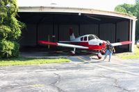 N7305J @ SMD - In her crib at Fort Wayne, Indiana's Smith Field.  Note the roundhouse style hangar. - by Bob Simmermon