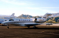 N900QS @ KPSP - Citation X on the Signature ramp KPSP - by Mark Kalfas