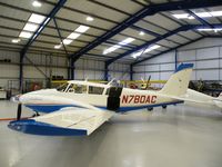 N780AC @ EGTB - Twin Comanche hangared at Booker