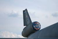 87-0124 @ KWRI - The tail of the last KC-10 built casts a familiar silhouette against a summer evening sky. - by Daniel L. Berek