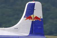 N996DM @ LOXZ - Red Bull Douglas DC-6B - by Juergen Postl