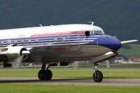 N996DM @ LOXZ - Red Bull Douglas DC-6B - by Juergen Postl