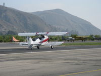 N32135 @ SZP - 1941 Waco UPF-7, Continental W670 220 Hp, a stunning showplane, landing roll Rwy 22 - by Doug Robertson