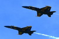 163093 @ DVN - Blue Angels at the Quad Cities Air Show, and I'm shooting into the sun. On left is 162826 - by Glenn E. Chatfield