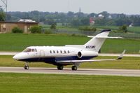 N523WG @ CID - Crossing runway 13/31 on Alpha on the way to Landmark FBO