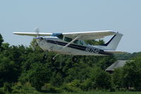 N8754Q @ I19 - 1976 C206 - by Allen M. Schultheiss