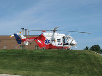 N365CH @ KBMI - Bloomington IL St Joseph Hospital Helipad - by Ken Gusek