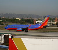 N217JC @ LAX - Southwest 2005 Boeing 737-7H4 in new colors - by Steve Nation