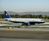 N437UA @ LAX - United 1997 Airbus A320-232 in older colors taxiing - by Steve Nation