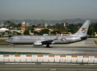 N569AS @ LAX - Alaska 2007 Boeing 737-890 in 'Starliner 75' 75th anniversary special marks powering up for t/o on RW 24L - by Steve Nation