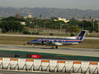 N582SW @ LAX - Sky west 1999 EMB-120R rolling on RW 24L - by Steve Nation