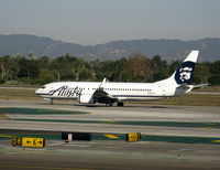 N593AS @ LAX - Alaska 2008 Boeing 737-890 rolling on RW 24L - by Steve Nation