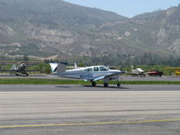 N541DB @ SZP - 1964 Beech S35 BONANZA, Continental IO-520-B 285 Hp, landing roll Rwy 22 - by Doug Robertson