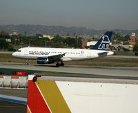 XA-MXJ @ LAX - Mexicana Airbus A-319-112 rolling on RW 24L - by Steve Nation