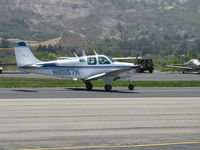 N8557M @ SZP - 1963 Beech 35 B33 DEBONAIR, Continental IO-470-K 225 Hp, landing roll Rwy 22 - by Doug Robertson