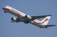 LY-SKR @ EBBR - Unusual visitor, climbing from rwy 25R, gear on the move.