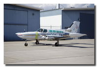 N75GB @ KATW - 1975 Cessna 402B, Old Freight DOG