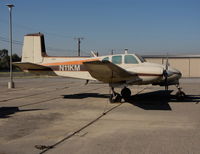 N11KM @ AJO - 1960 Beech H50 twin Bonanza with large & small registration @ photographer friendly Corona Municipal Airport, CA - by Steve Nation
