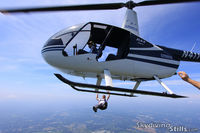N411TC @ 7B9 - Skydivers exit the R44 5,000 feet over Ellington, CT - by Dave G