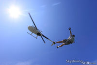 N411TC @ 7B9 - A skydiver falls backwards from the R44 over Ellington, CT - by Dave G