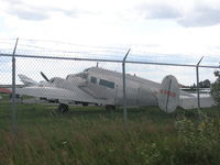 C-FCLO @ CYOO - Not a great shot - Parked in front of Enterprise Air Oshawa - by OshawaBuddha