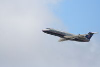 N908SW @ KLAX - United Express, (Skywest) Canadair CL-600-2B19 departing 25R KLAX - by Mark Kalfas