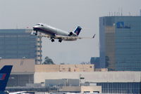 N908SW @ KLAX - United Express, (Skywest) Canadair CL-600-2B19, N908SW, departing 25R KLAX - by Mark Kalfas