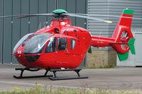G-WASS @ EGBJ - Eurocopter EC135T2 - Being prepared for Wales Air Ambulance at Gloucestershire (Staverton) Airport - by Terry Fletcher