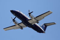 N233SW @ KLAX - United Express, (Skywest) EMB-120ER, N233SW departing 25R KLAX - by Mark Kalfas