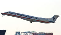 N380SK @ KEWR - Sleek regional jet launches into the early morning summer haze at Newark. - by Daniel L. Berek