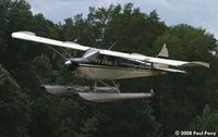N2491M @ 15NC - Making a pass, showing off her old floats