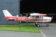 G-BAMC @ EGCW - Cessna 150 hangared on 2009 Welshpool Air Day